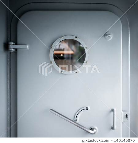Heavy metal door with round porthole window and lever handle Heavy metal door with round porthole window and lever handle 140146870