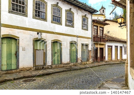 Aged colonial-style houses Aged colonial-style houses 140147467