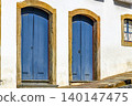 Old doors with arches and stone frames 140147475