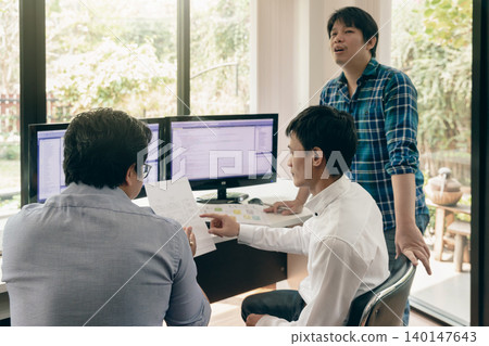 Programmers team working in a software developing. Developing programming and coding technologies. Website design. Cyber space concept. Programmers team working in a software developing. Developing programming and coding technologies. Website design. Cyber space concept. 140147643