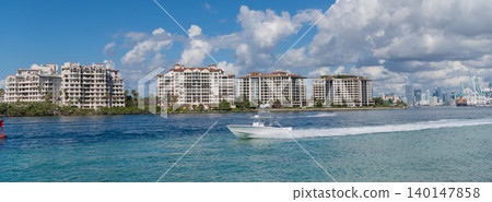 Resort city with residential building. Residential luxury building of Miami, Florida. Miami beach architecture. South beach cityscape. Cityscape skyline of Florida sail boat. Miami downtown skyline 140147858