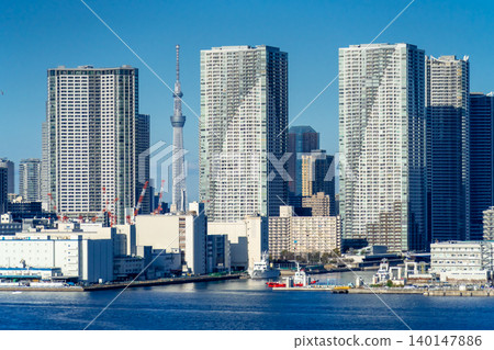 A cluster of high-rise apartment buildings in Harumi, Tokyo. A cluster of high-rise apartment buildings in Harumi, Tokyo. 140147886