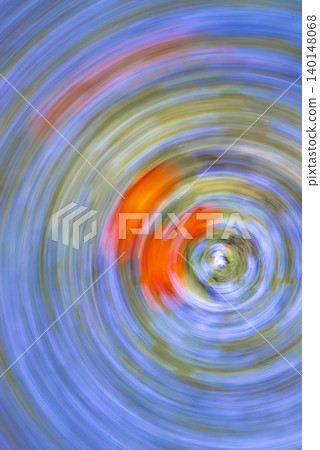 Abstract Orange Flowers in Blue Swirling Motion 140148068
