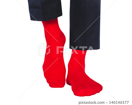 Man wearing bright red socks with black pants Man wearing bright red socks with black pants 140148377