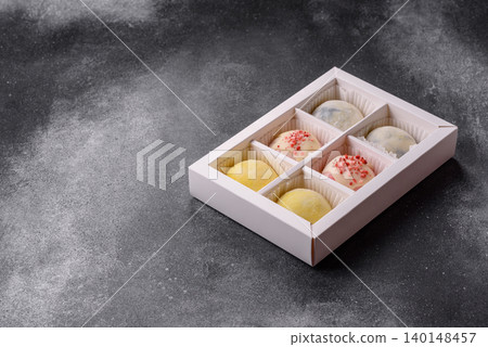 Japanese sweet frozen mochi with rice dough, fruit, and chocolate filling. Japanese mochi 140148457