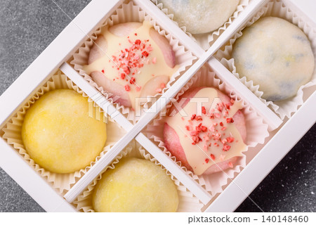 Japanese sweet frozen mochi with rice dough, fruit, and chocolate filling. Japanese mochi 140148460