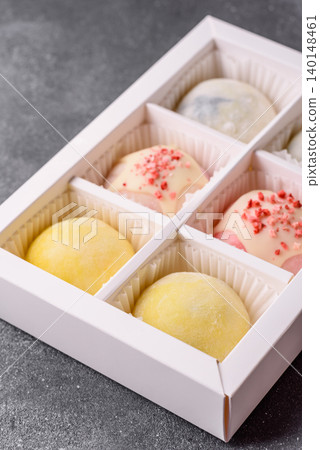 Japanese sweet frozen mochi with rice dough, fruit, and chocolate filling. Japanese mochi 140148461