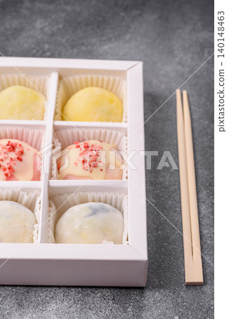 Japanese sweet frozen mochi with rice dough, fruit, and chocolate filling. Japanese mochi 140148463