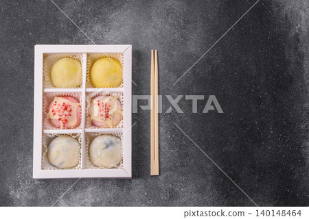 Japanese sweet frozen mochi with rice dough, fruit, and chocolate filling. Japanese mochi 140148464