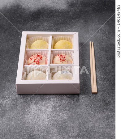 Japanese sweet frozen mochi with rice dough, fruit, and chocolate filling. Japanese mochi 140148465