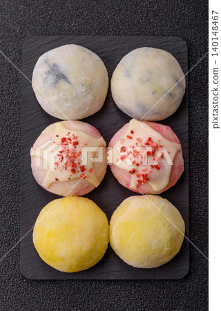 Japanese sweet frozen mochi with rice dough, fruit, and chocolate filling. Japanese mochi 140148467
