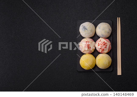 Japanese sweet frozen mochi with rice dough, fruit, and chocolate filling. Japanese mochi 140148469