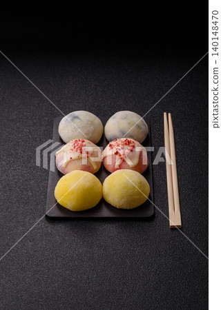 Japanese sweet frozen mochi with rice dough, fruit, and chocolate filling. Japanese mochi 140148470