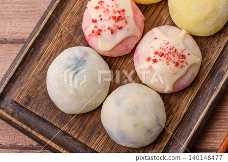 Japanese sweet frozen mochi with rice dough, fruit, and chocolate filling. Japanese mochi 140148477