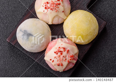 Japanese sweet frozen mochi with rice dough, fruit, and chocolate filling. Japanese mochi 140148487