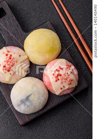 Japanese sweet frozen mochi with rice dough, fruit, and chocolate filling. Japanese mochi 140148490