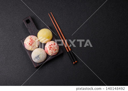 Japanese sweet frozen mochi with rice dough, fruit, and chocolate filling. Japanese mochi 140148492