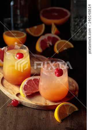 Summer cocktails with grapefruit and orange juice. Summer cocktails with grapefruit and orange juice. 140148614