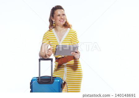 Expectant Female Traveler with Luggage and Digital Tablet Expectant Female Traveler with Luggage and Digital Tablet 140148691