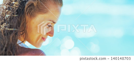relaxed young woman on beach relaxed young woman on beach 140148703