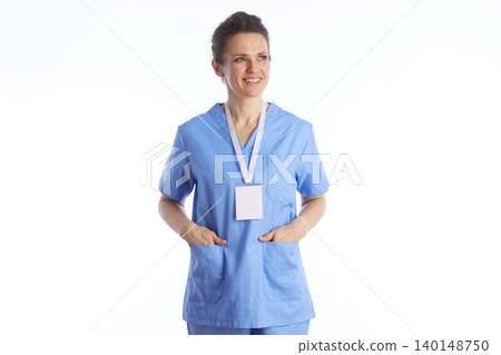 Relaxed Female Healthcare Provider in Blue Scrubs Relaxed Female Healthcare Provider in Blue Scrubs 140148750