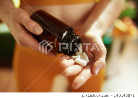 Handful of Daily Vitamins and Nutritional Supplements Handful of Daily Vitamins and Nutritional Supplements 140148871