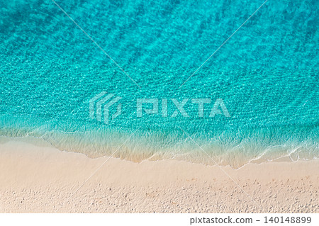 Summer seascape beautiful closeup. Blue sea water in sunny day. Top view from drone. Sea aerial surf, amazing tropical nature background. Mediterranean bright sea bay waves splashing beach sandy coast 140148899
