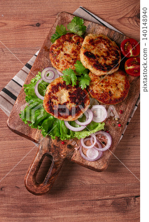 fried chicken cutlets, minced chicken, with vegetables, on a cutting board, with vegetable salad, top view, homemade, no people, fried chicken cutlets, minced chicken, with vegetables, on a cutting board, with vegetable salad, top view, homemade, no people, 140148940