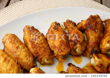 Roasted Chicken Wings with Golden Texture Roasted Chicken Wings with Golden Texture 140149705