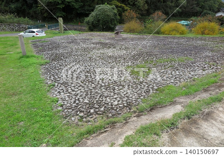 Kamiyodo Temple Ruins (National Historic Site) in Yonago City, Tottori Prefecture: Stone pavement remains, some of which have been restored. Kamiyodo Temple Ruins (National Historic Site) in Yonago City, Tottori Prefecture: Stone pavement remains, some of which have been restored. 140150697
