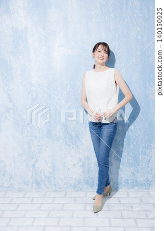 Middle-aged woman in denim Middle-aged woman in denim 140150925