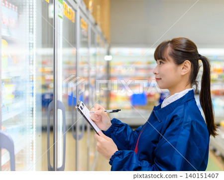 Woman checks inventory 140151407