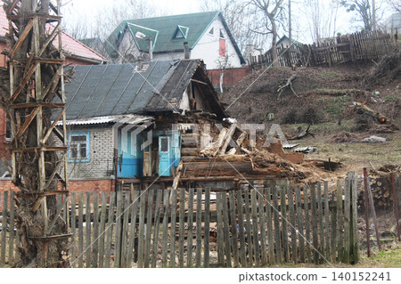 Old wooden dilapidated house. War and Destruction 140152241