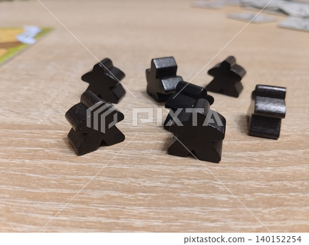 black meeples. Close-up of the player's chips 140152254