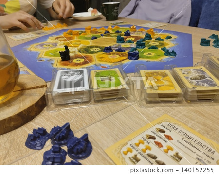 Mozyr, Belarus, April 10 2025: board game Catan. Gameplay Mozyr, Belarus, April 10 2025: board game Catan. Gameplay 140152255