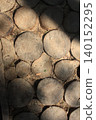Laid tree cuts on the path 140152295