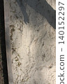 light white sand with shadows on a sunny day. Textured background 140152297