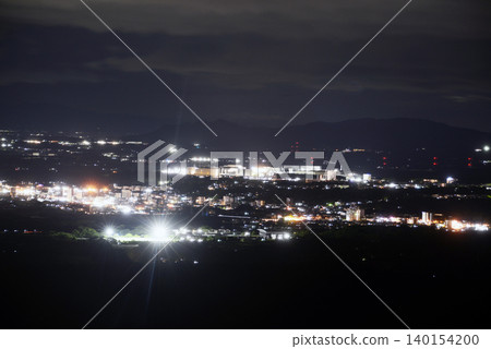 Semiconductor Techno Park and the town of Otsu at night 140154200