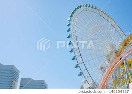 A Ferris wheel standing out against the blue sky (Yokohama Cosmo World) A Ferris wheel standing out against the blue sky (Yokohama Cosmo World) 140154567