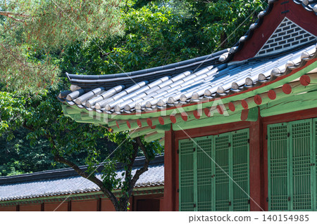 Seoul, South Korea - May. 30, 2026 : Peaceful and scenic view of traditional Korean architecture and lush greenery at Jongmyo Shrine, Seoul, on a clear early summer afternoon Seoul, South Korea - May. 30, 2026 : Peaceful and scenic view of traditional Korean architecture and lush greenery at Jongmyo Shrine, Seoul, on a clear early summer afternoon 140154985