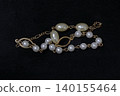 Precious metals, gold bars, rings, necklaces, ornaments, gemstones 140155464