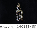 Precious metals, gold bars, rings, necklaces, ornaments, gemstones 140155465