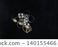 Precious metals, gold bars, rings, necklaces, ornaments, gemstones 140155466