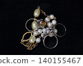Precious metals, gold bars, rings, necklaces, ornaments, gemstones 140155467