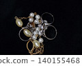 Precious metals, gold bars, rings, necklaces, ornaments, gemstones 140155468
