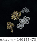 Precious metals, gold bars, rings, necklaces, ornaments, gemstones 140155473