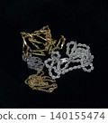 Precious metals, gold bars, rings, necklaces, ornaments, gemstones 140155474