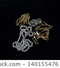 Precious metals, gold bars, rings, necklaces, ornaments, gemstones 140155476
