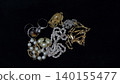 Precious metals, gold bars, rings, necklaces, ornaments, gemstones 140155477