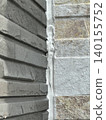 Exterior wall with deteriorated caulking 140155752